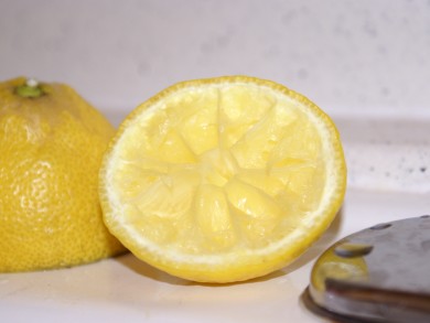 Half a cut lemon rubbed on a dirty surface cleans it right up!