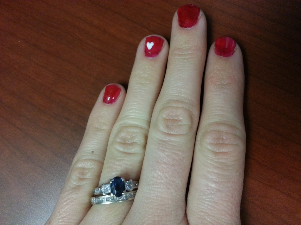 Valentine's Day nails and wedding ring Valentine's Day nails and wedding ring.