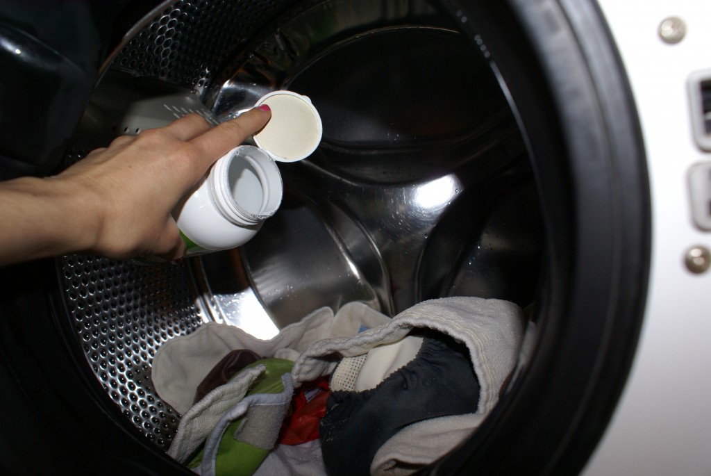 Citric acid for cloth diapers Sprinkling citric acid on wet cloth diapers.