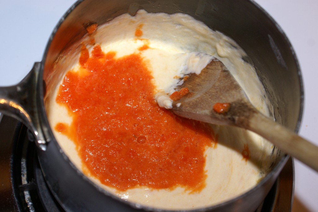 Red pepper in mac'n'cheese Stir the red pepper puree into the mac'n'cheese sauce.