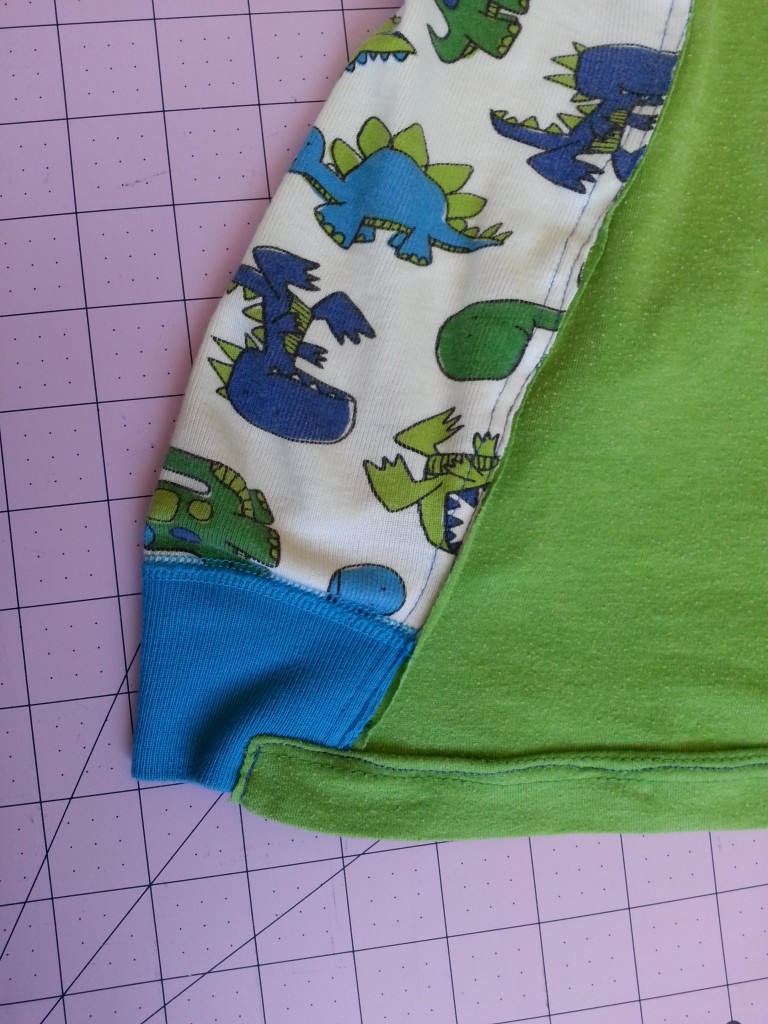 Use the t-shirt's original hem to finish the bottom of pajama hack. Use the t-shirt's original hem to finish the bottom of pajama hack.