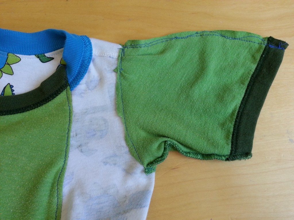 Carefully straight stitch the sleeve onto the pajamas - inside pajamas to outside sleeve. Carefully straight stitch the sleeve onto the pajamas - inside pajamas to outside sleeve.