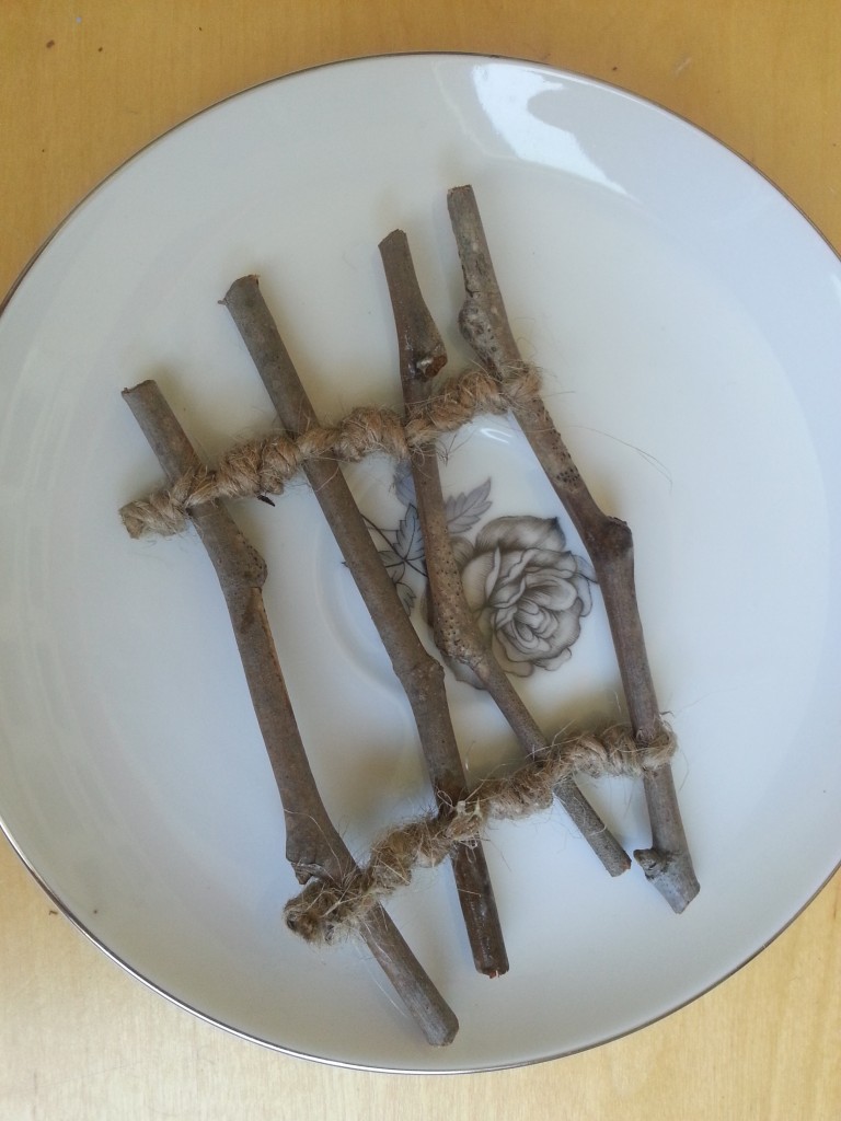 The finished product - I like the silver rose china pattern china with the rustic sticks and jute. The finished product - I like the silver rose china pattern china with the rustic sticks and jute.