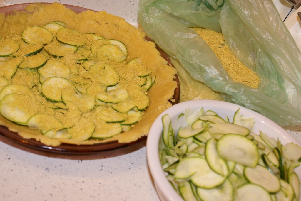 Zucchini nutritional yeast Layer the zucchini slices and a few sprinkles of nutritional yeast in the pie crust.