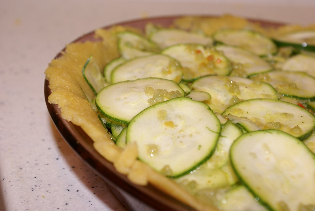 Zucchini pie with liquid This is how your pie will look once you pour the liquid over it - mmm, garlic!