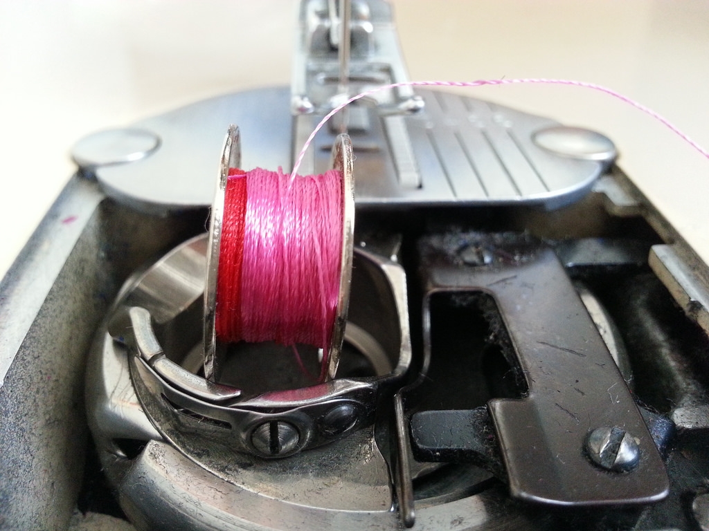 I wasted a lot of thread before I realized I don't have to pull it all off the bobbin just to change the color.