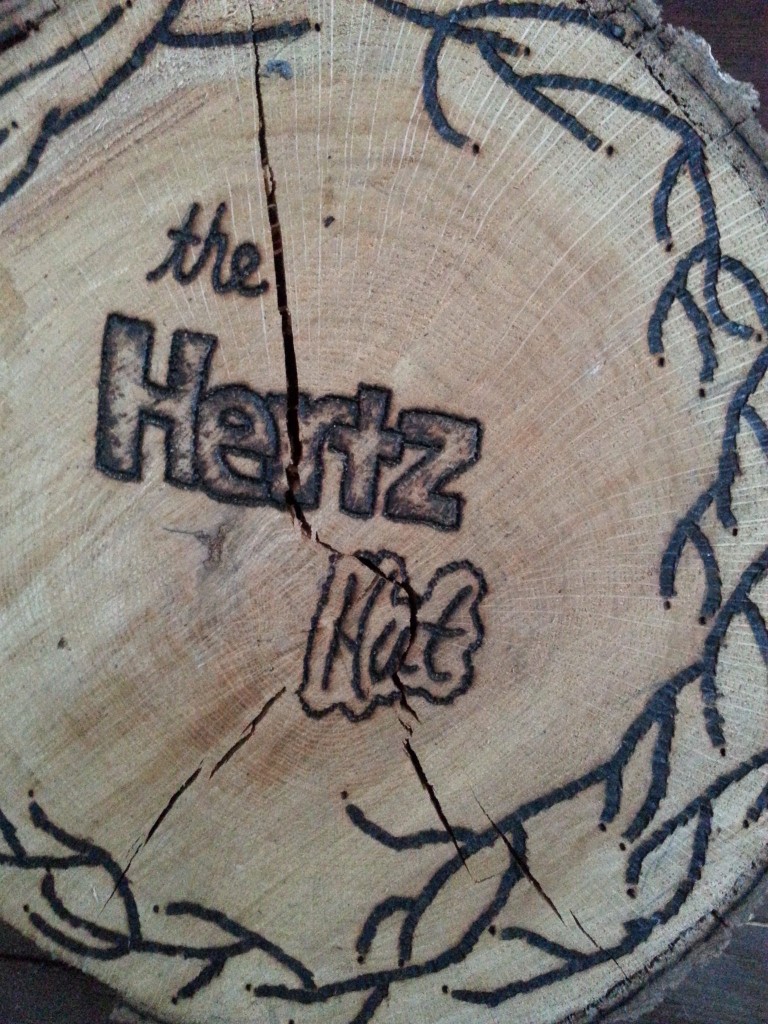 A sign from one of our previous visits greets us outside our mountain accommodations.