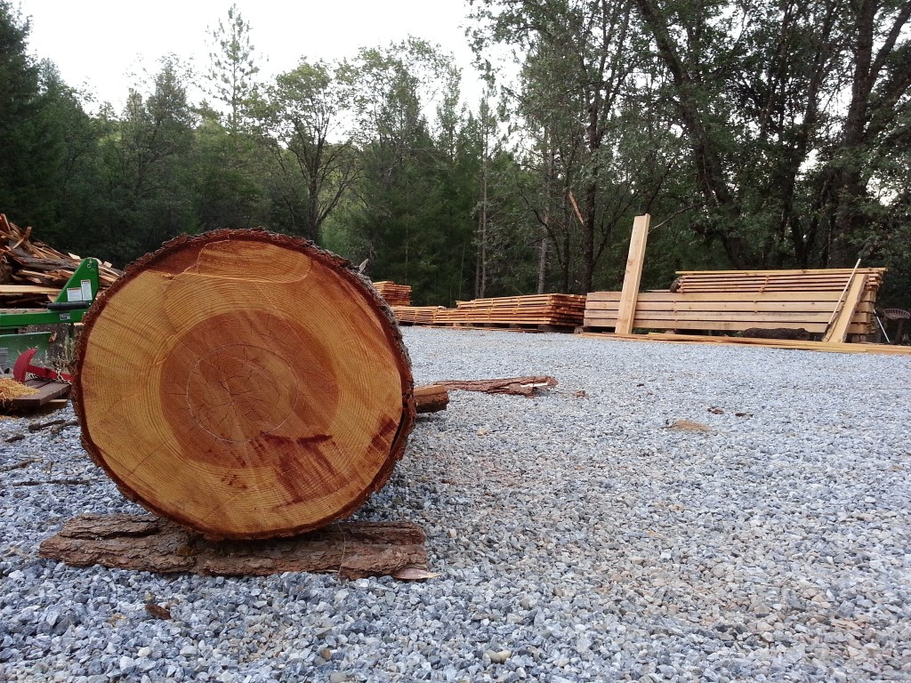 Porter lumber yard with ground and planks ready for building a metal shop.