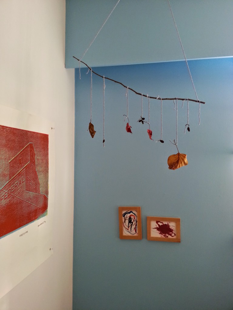 Arlo and I made this mobile with some nature things he collected.  He also painted these watercolors.  They are titled, from left to right, "Pool" and "Flower."
