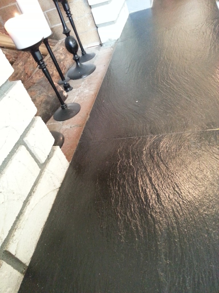 Wet look slate.  The only problem is that it shows every little speck of dust.